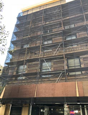 scaffolding on the side of a large building