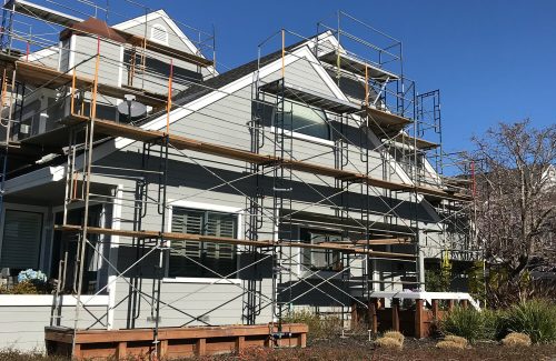 scaffolding on the outside of a residence